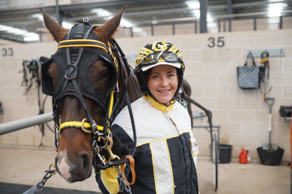 It looks like 'handlebars down' for this mare